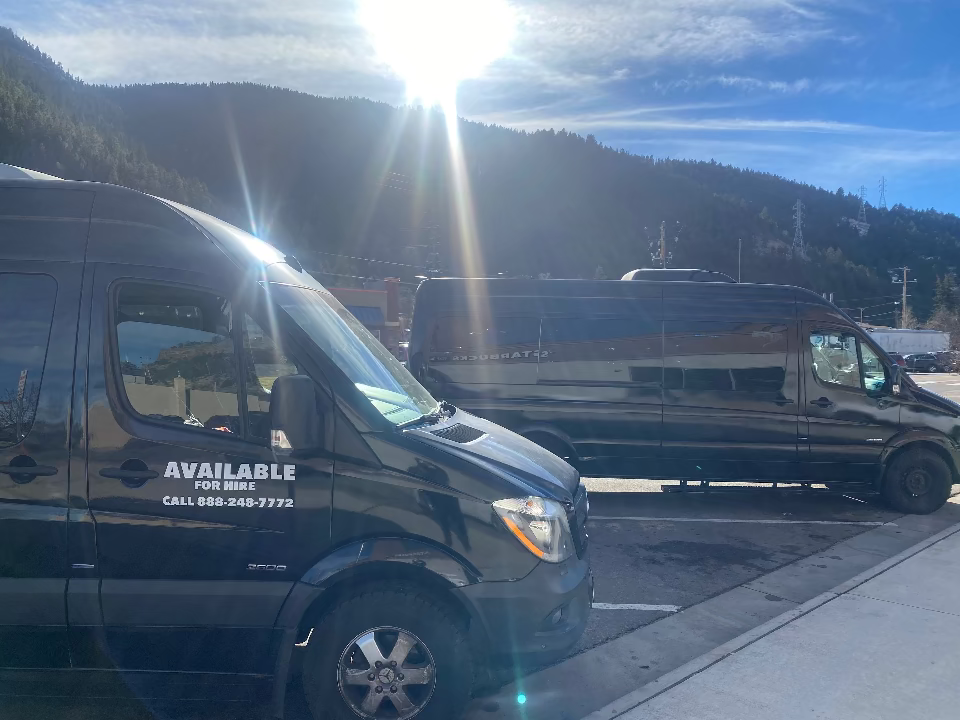 Two vans parked in Idaho Springs, co 888-248-7772